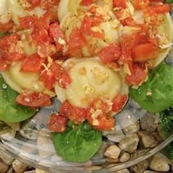 Cheese Ravioli with Fresh Tomato and Artichoke Sauce